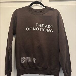 Graphic Brown Sweatshirt with White Text and poetic quote